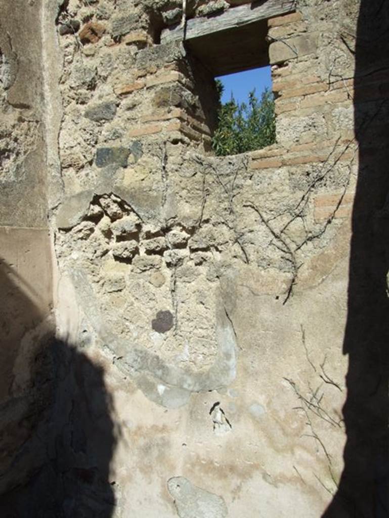 I.3.27 Pompeii.  March 2009. East wall of small room with window onto Vicolo.