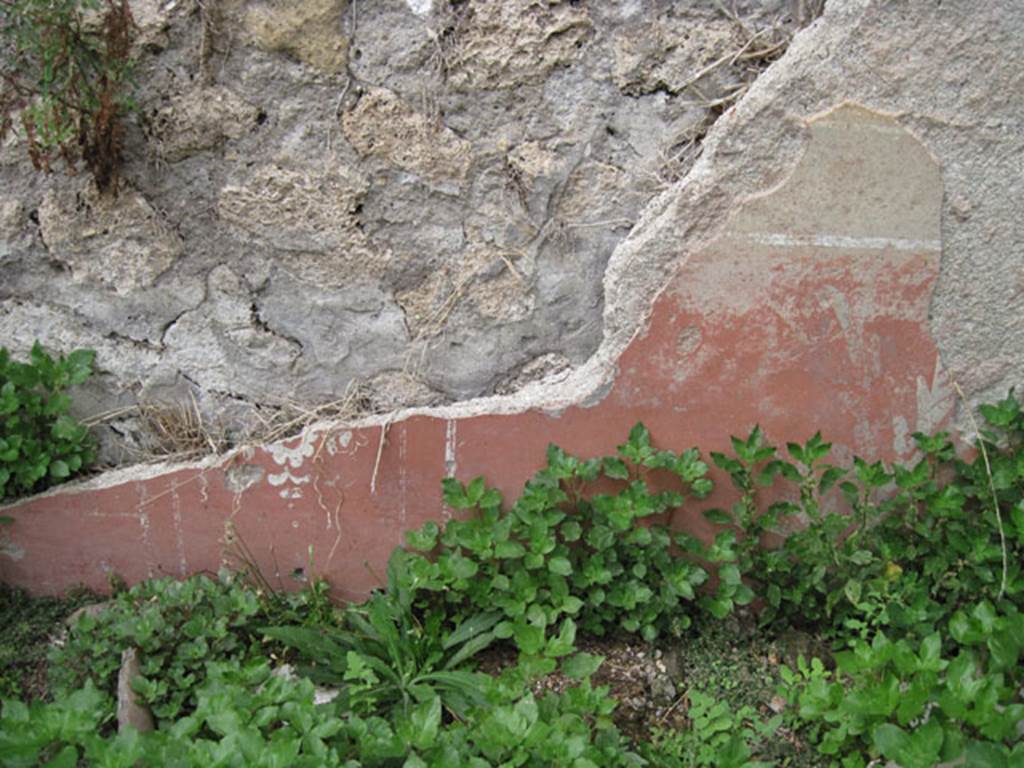I.3.29 Pompeii. September 2010. Room 4, north wall, with detail of fresco from lower wall. 
Photo courtesy of Drew Baker.