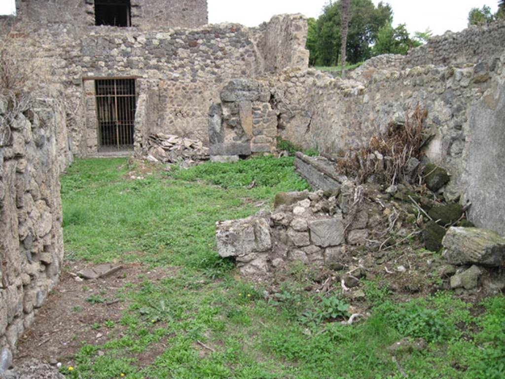 I.3.29 Pompeii. September 2010. Looking east from room 5, through doorway into atrium, room 1. Photo courtesy of Drew Baker.