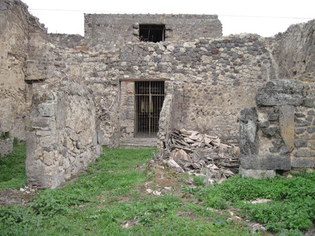 I.3.29 Pompeii. September 2010. Looking east from room 1 the atrium, towards fauces and doorway onto Vicolo del Citarista. The doorways to room 2 on the north side and room 6 on the south side are visible.  Photo courtesy of Drew Baker.