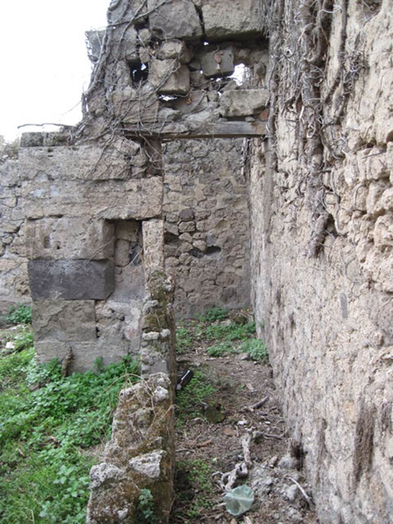 I.3.29 Pompeii. September 2010. Looking west along small corridor, with remains of stairs to upper floor leading from far end. Photo courtesy of Drew Baker.