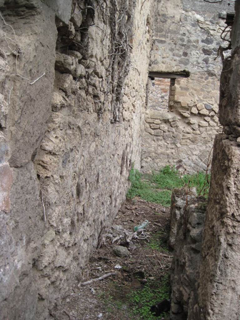 I.3.29 Pompeii. September 2010. Looking east from north end of corridor, along site of stairs to upper floor. Photo courtesy of Drew Baker.