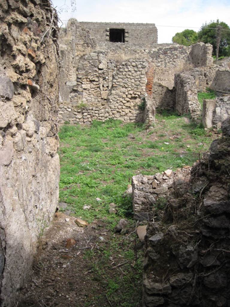 I.3.30 Pompeii. September 2010. Looking east through doorway of room 3, towards peristyle. Photo courtesy of Drew Baker.