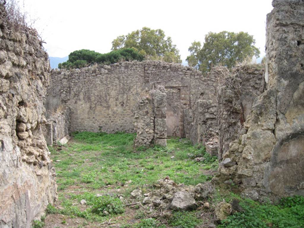 I.3.30 Pompeii. September 2010. Room 5, looking towards the south-east end of the south wall, with remains of doorway to peristyle. Photo courtesy of Drew Baker.