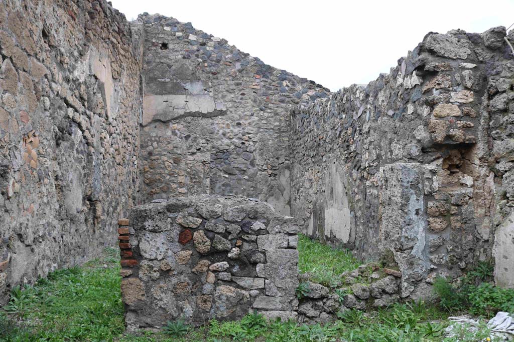 I.4.7 Pompeii. December 2018. East wall of second room, with two doorways to easterly room. Photo courtesy of Aude Durand.