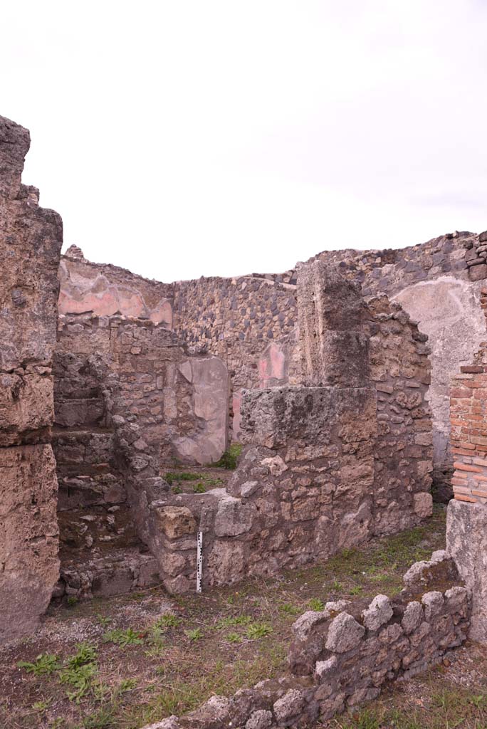 I.4.9 Pompeii. October 2019. 
Corridor i, looking north-east from tablinum, towards steps to upper floor in corridor, and wall of room l (L).
Foto Tobias Busen, ERC Grant 681269 DÉCOR.