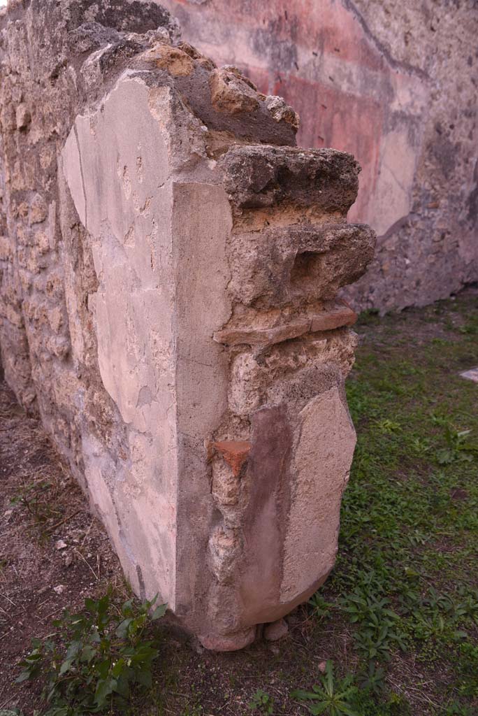 I.4.9 Pompeii. October 2019. 
Room k, doorway pilaster at west end, between room I (L), on left, and room m, on right.
Foto Tobias Busen, ERC Grant 681269 DÉCOR.