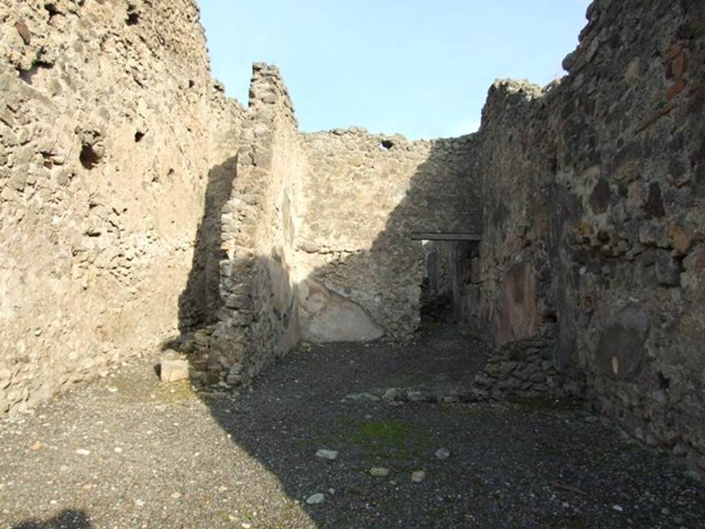 I.4.11 Pompeii. December 2007. Looking east.  The narrow caupona has rooms, one behind the other.