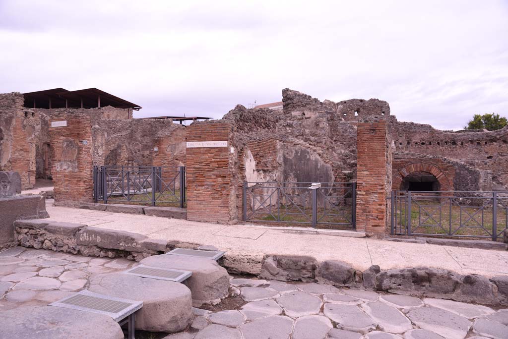 I.4.15, on left, I.4.14, in centre, and I.4.13, on right, Pompeii. October 2019. 
Looking towards east side of Via Stabiana at Holconius’ crossroads.       
Foto Tobias Busen, ERC Grant 681269 DÉCOR.