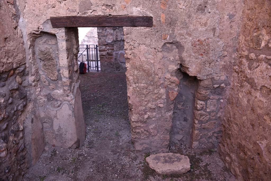 I.4.18 Pompeii. October 2019. North wall of rear room, looking through doorway into workshop.
Foto Tobias Busen, ERC Grant 681269 DÉCOR.
