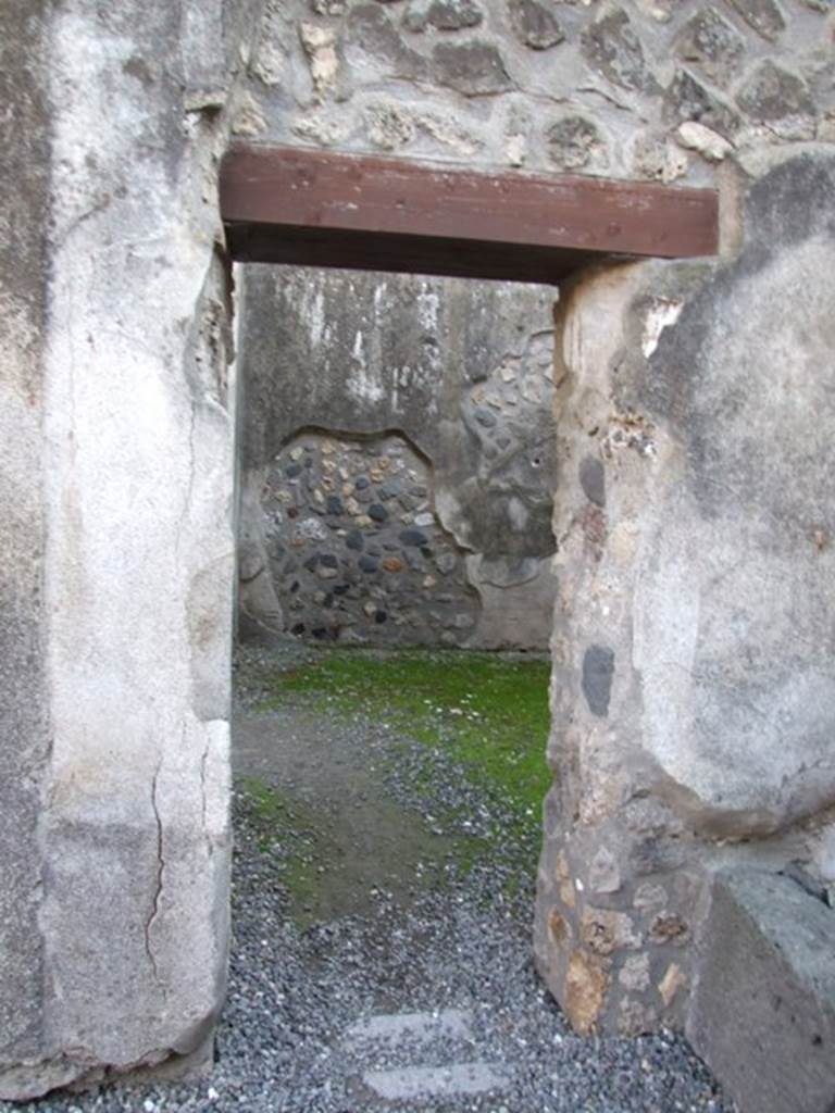 I.4.25 Pompeii. December 2007. Doorway in south wall of room 51, leading into room 52.