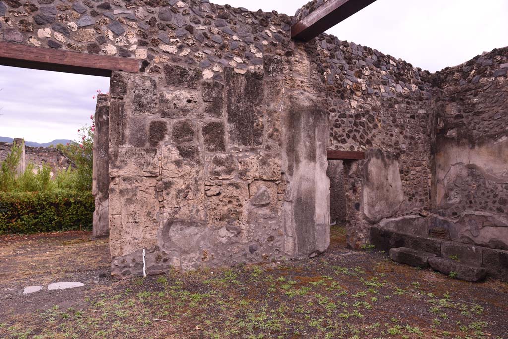 I.4.25 Pompeii. September 2019. 
Room 47, south wall of atrium on west side of doorway to upper peristyle 56.
The doorway to room 51, is on right, with doorway in south wall into room 52, centre right.
Foto Tobias Busen, ERC Grant 681269 DÉCOR.