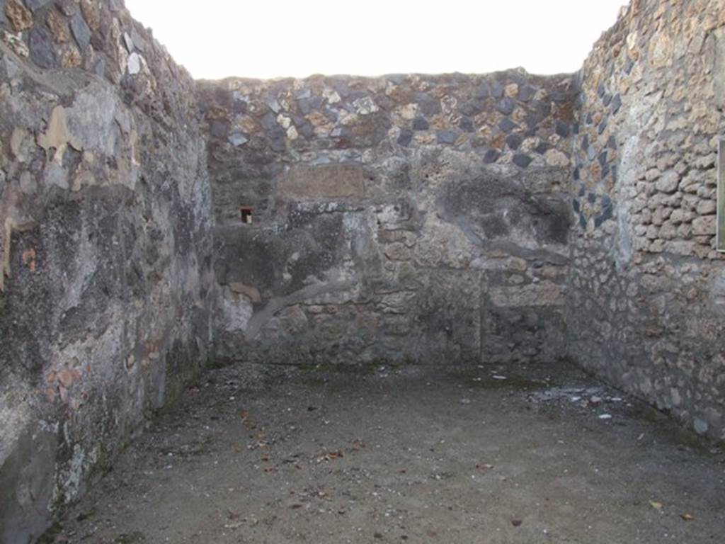 I.4.25 Pompeii. December 2007. Room 37, triclinium on west side of lower peristyle. 
Looking at west wall. The west wall used to have a wall painting of Endymion and Selene.
The south wall used to have a wall painting of Adonis and Aphrodite. 
Both these paintings are now lost. The floor was black and white marble.
There seems to be some confusion as to what was on the south or west walls, see Warscher above.
According to Warscher – on the west wall one cannot see any traces of decoration.
The room gives the impression of total devastation: it was difficult to show that it had been adorned with paintings.
(Sulla parete ovest non si vede nessuna traccia di decorazione.
La stanza da l’impressione d’una devastazione totale: era difficile rappresentarci che essa fosse adorna di quadri.)
See Warscher, T. 1942. Catalogo illustrato degli affreschi del Museo Nazionale di Napoli. Sala LXXXII. Vol.4. Rome, Swedish Institute