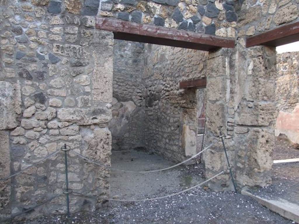 I.4.25 Pompeii. December 2007. 
Doorway to room 36, cubiculum on north side of room 37, with a connecting door to the tablinum 14, on right.