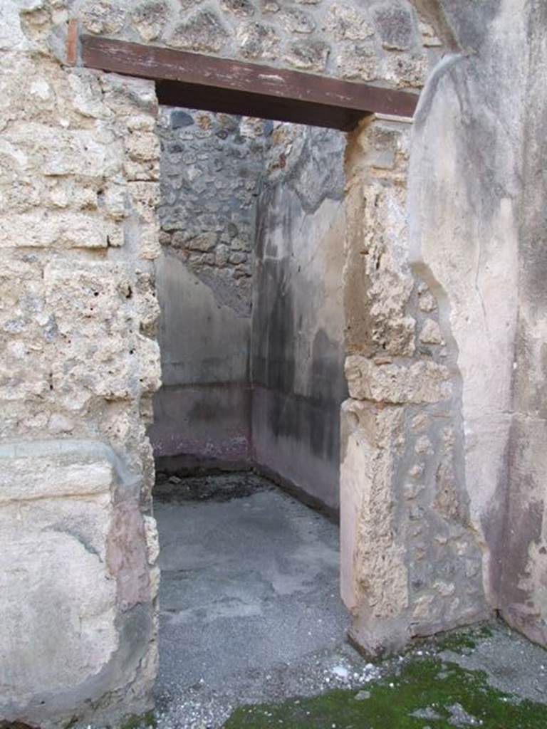 I.4.25 Pompeii. December 2007. 
Doorway to unnumbered room next to room 30 (? room 66), cubiculum. Looking south.