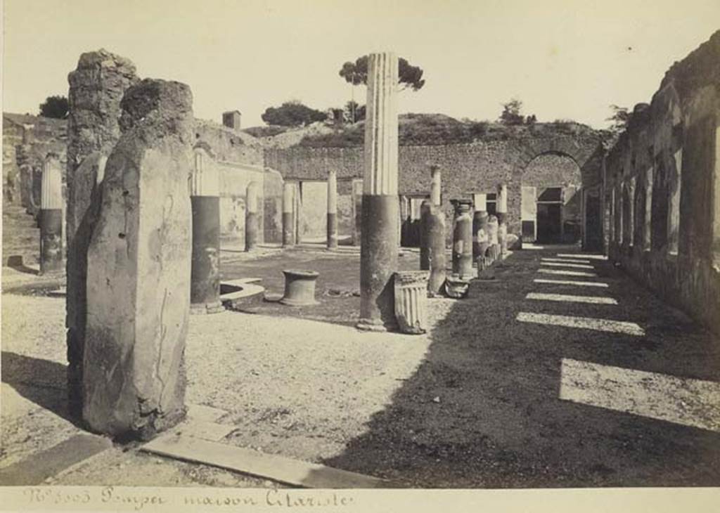 I.4.5/1.4.25 Pompeii. Old undated photograph by Amodio, numbered 3003, in an album dated c.1873. Looking east across the middle peristyle 17. Photo courtesy of Rick Bauer.