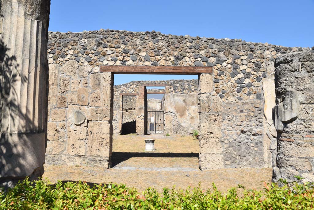 I.4.25 Pompeii. September 2020. 
Looking across north portico of upper peristyle 56, with open doorway to atrium 47, looking north across to entrance corridor.
Foto Tobias Busen, ERC Grant 681269 DÉCOR