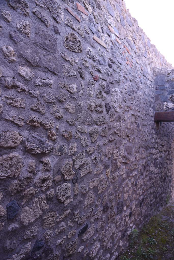 I.4.25/I.4.5 Pompeii. October 2019. 
Looking south along east wall from north end of Corridor 13A, or unnumbered corridor. 
Foto Tobias Busen, ERC Grant 681269 DÉCOR.