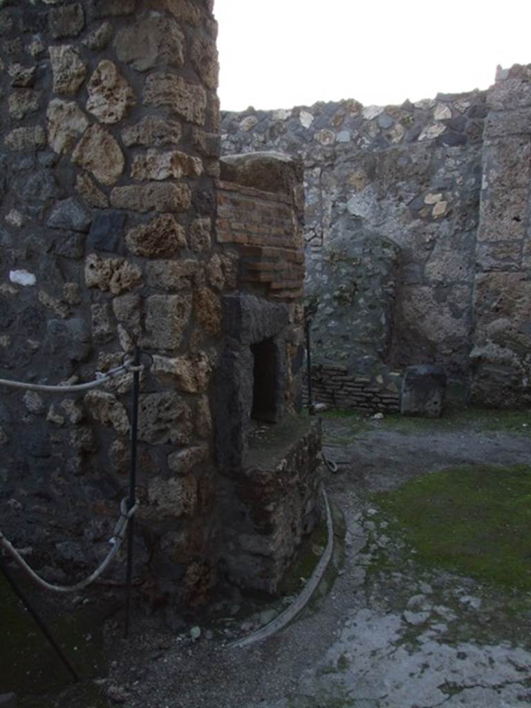 I.4.25/I.4.5 Pompeii. December 2007. 
Room 42, looking west in kitchen with oven, or furnace for baths?