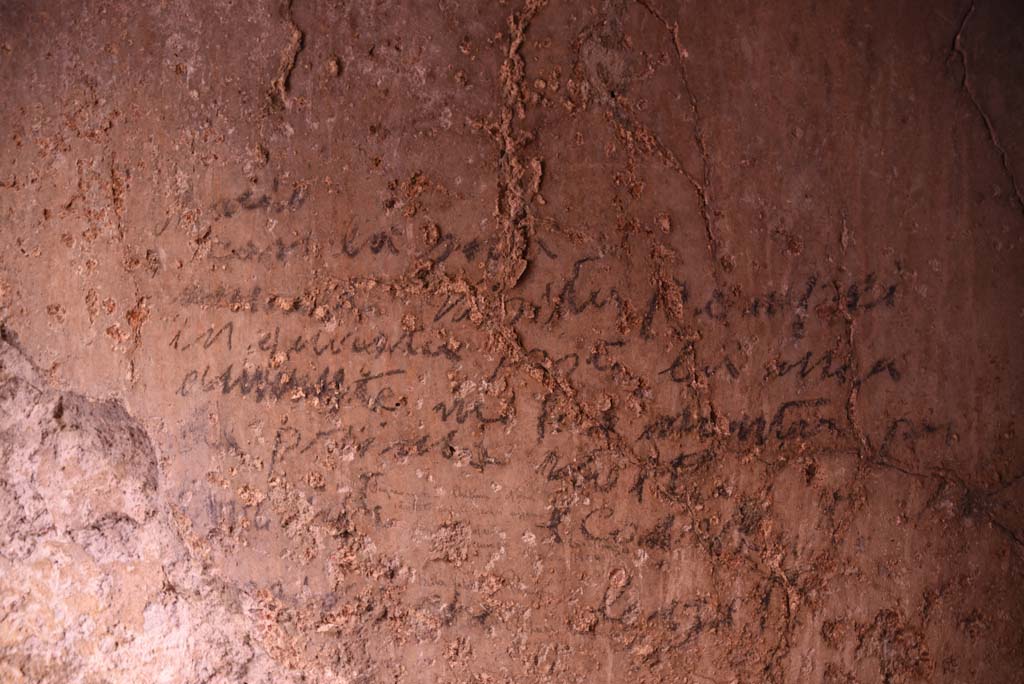 I.4.25/I.4.5 Pompeii. October 2019. Unnumbered corridor/room, detail of writing from east wall. 
Foto Tobias Busen, ERC Grant 681269 DÉCOR.