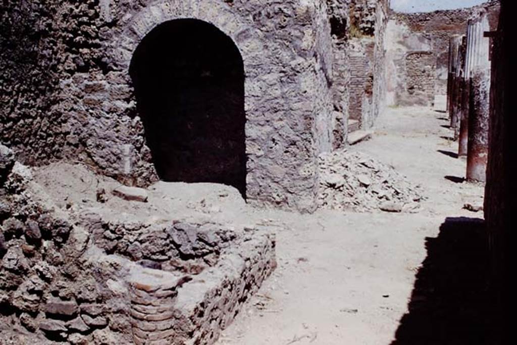 I.4.25 Pompeii. 1966. 
Looking across room 43 towards the middle peristyle 17, with steps to upper peristyle 56. Photo by Stanley A. Jashemski.
Source: The Wilhelmina and Stanley A. Jashemski archive in the University of Maryland Library, Special Collections (See collection page) and made available under the Creative Commons Attribution-Non Commercial License v.4. See Licence and use details.
J66f0568