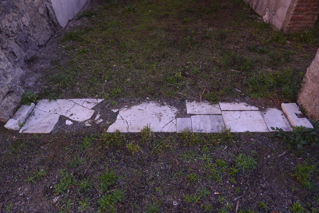 I.4.25 Pompeii. October 2019. Room 58, entrance threshold or sill, looking east.
Foto Tobias Busen, ERC Grant 681269 DÉCOR.