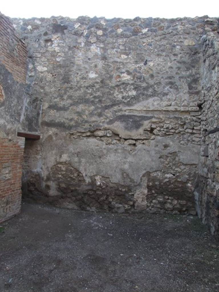 I.4.28 Pompeii. December 2007. Room 26, looking west.
The doorway on the left leads to room 65, and the blocked doorway connecting to I.4.25 is on the right.