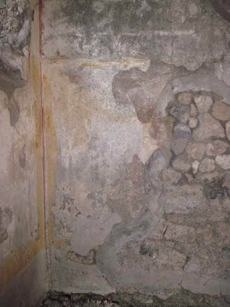 I.5.2 Pompeii. September 2010. North-east corner and east wall with fresco work. Photo courtesy of Drew Baker.