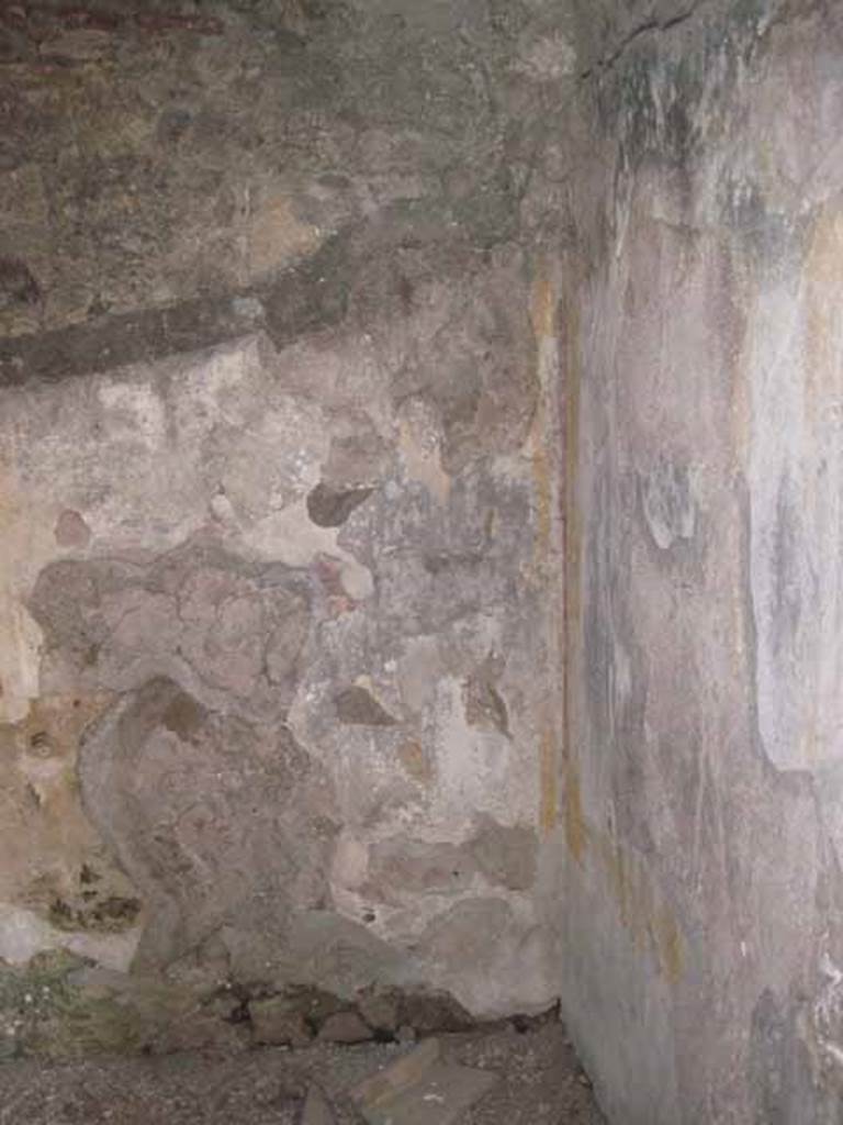 I.5.2 Pompeii. September 2010. East wall and south-east corner with fresco work. Photo courtesy of Drew Baker.