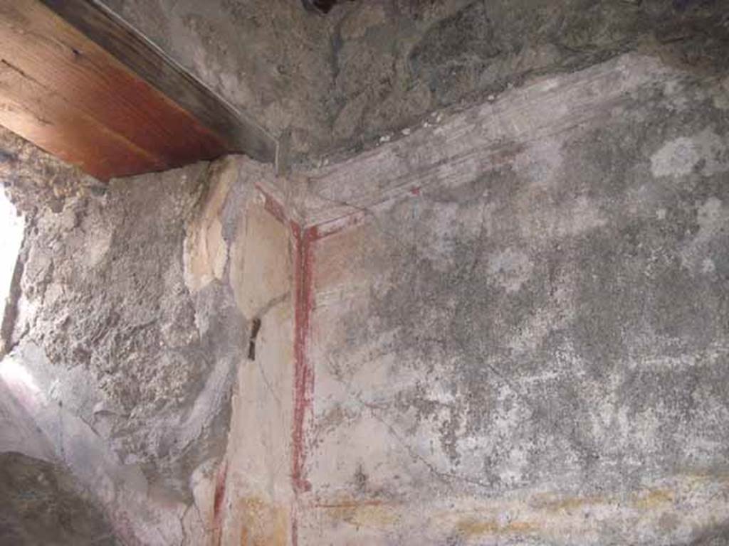 I.5.2 Pompeii. September 2010. North-east corner of small room with detail of plaster cornice work. Photo courtesy of Drew Baker.