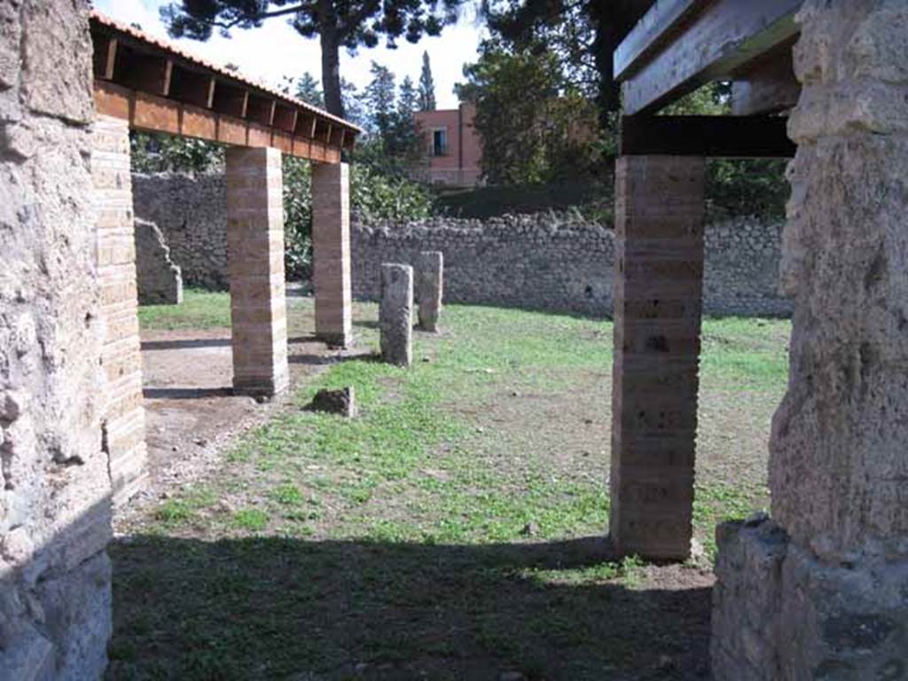 I.5.2 Pompeii. September 2010. Looking south through doorway to peristyle area. Photo courtesy of Drew Baker.