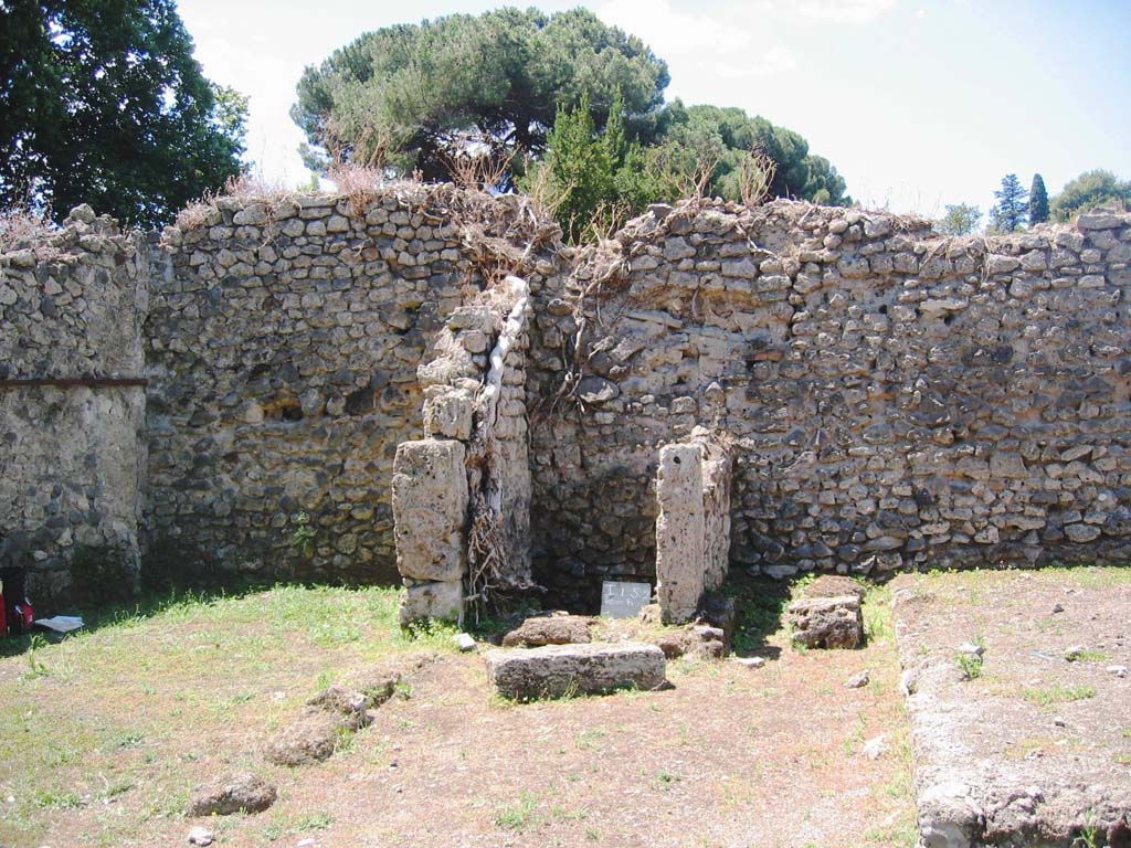 I.5.2 Pompeii. July 2008. 
Looking west to south-west corner and west wall of peristyle area, showing small room with latrine. Photo courtesy of Barry Hobson.