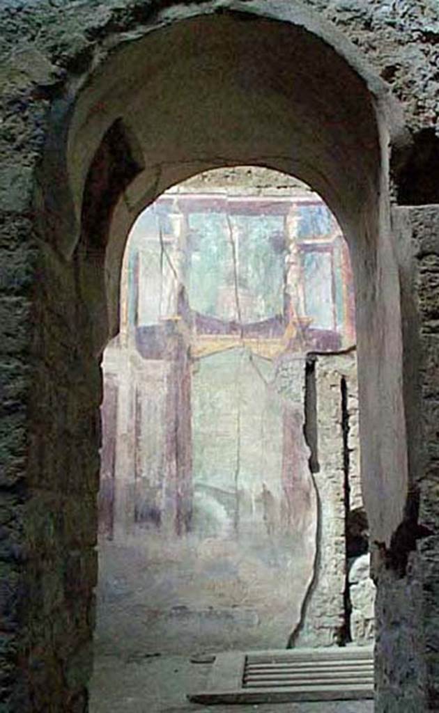 I.6.2 Pompeii. December 2007. 
Looking north through arched doorway to frigidarium.