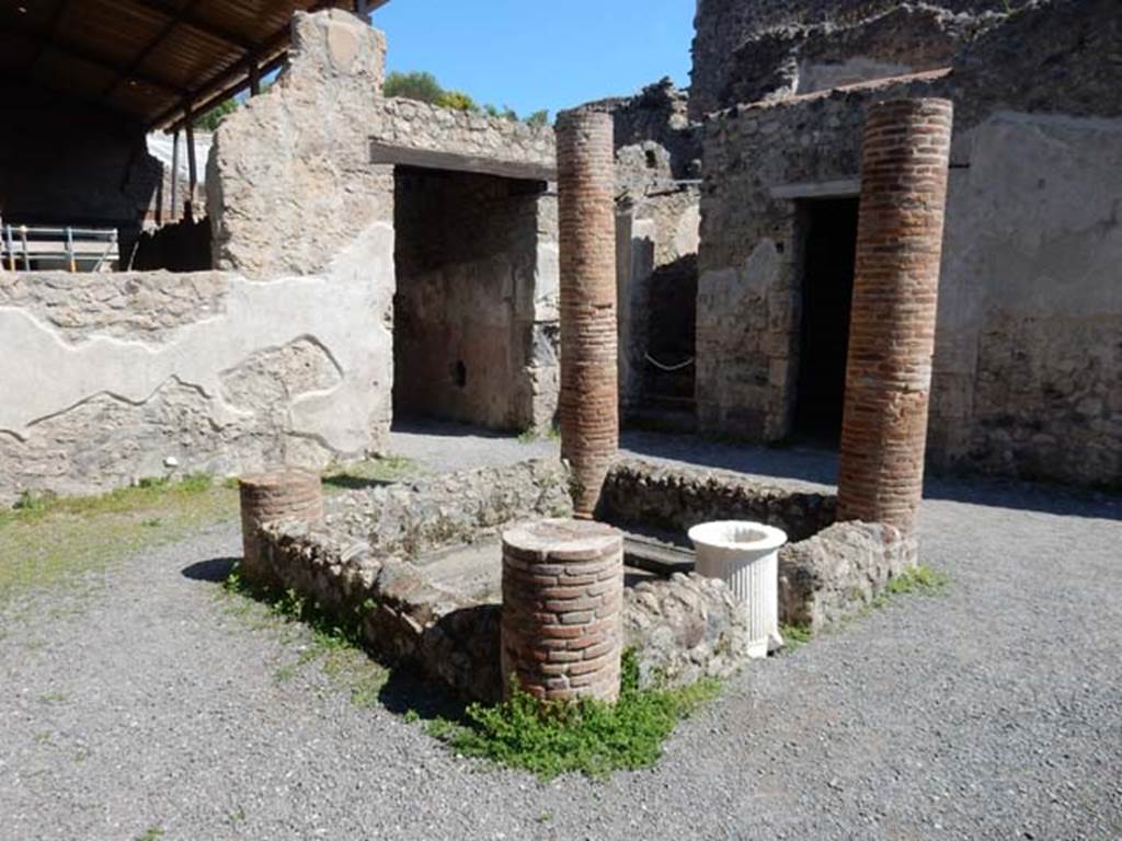 I.6.2 Pompeii. May 2016. Looking north-east across impluvium in atrium, towards stairs to upper floor.  Photo courtesy of Buzz Ferebee.