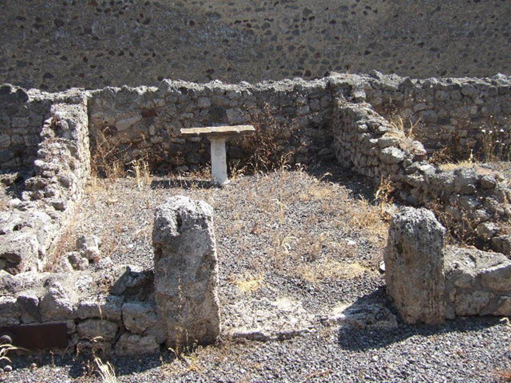 I.6.2 Pompeii. May 2006.  Room on east side, with marble table.