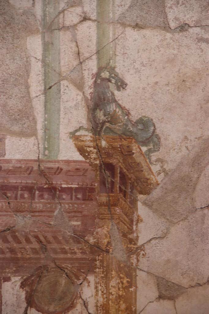I.6.4 Pompeii. October 2024. 
Room 2, detail from north end of east wall. Photo courtesy of Klaus Heese.