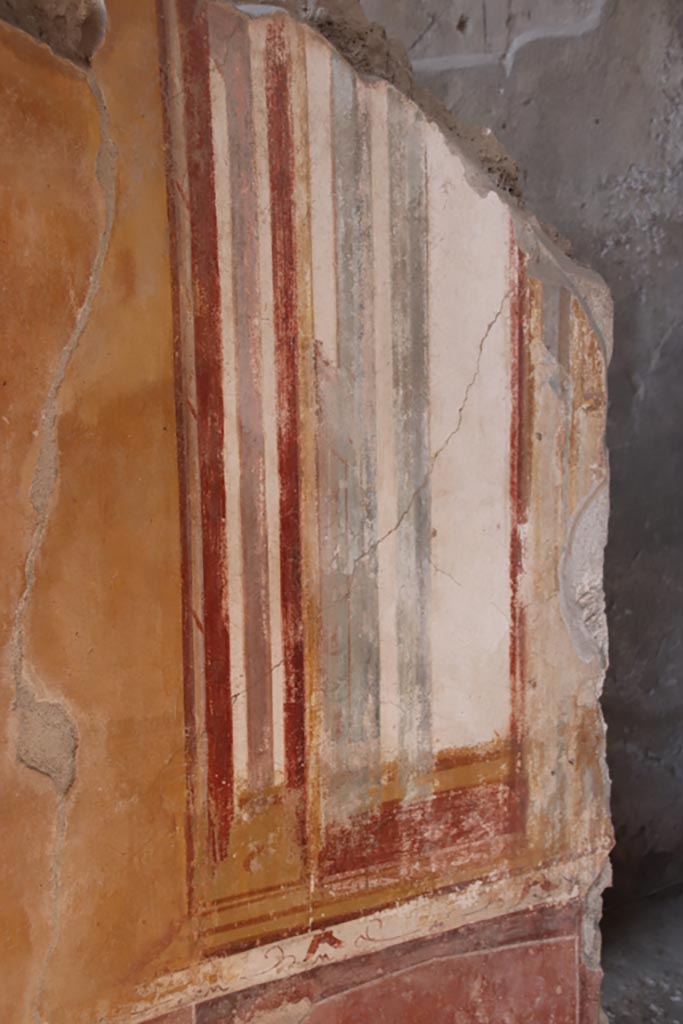 I.6.4 Pompeii. October 2022. 
Room 4, detail from north wall at west end. Photo courtesy of Klaus Heese.
