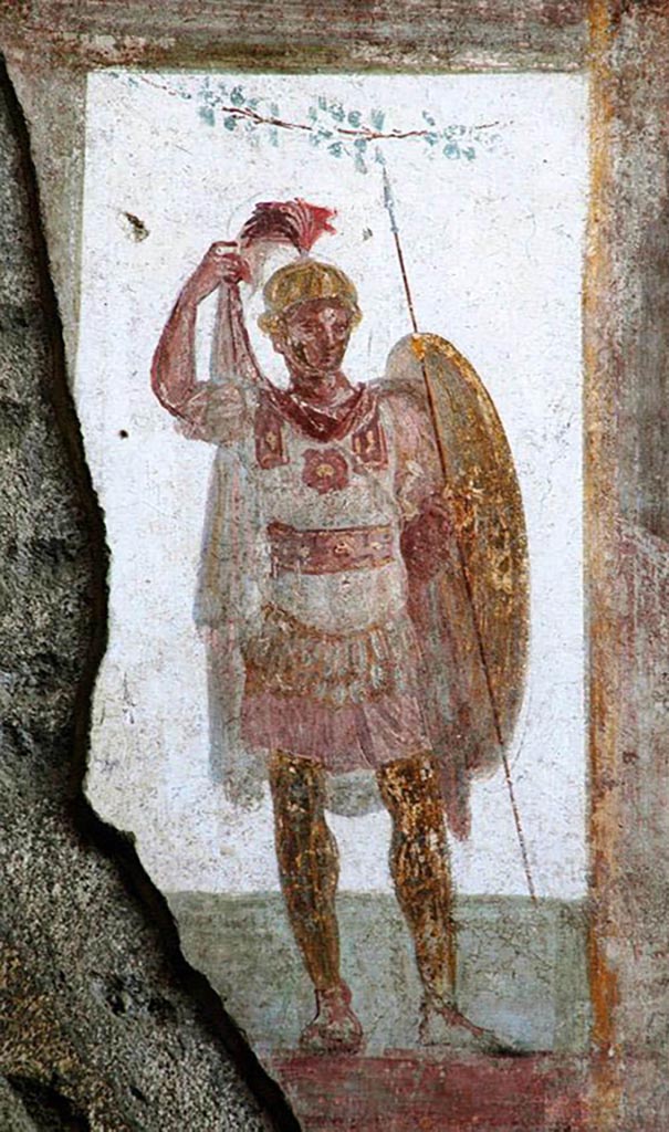 I.6.4 Pompeii. December 2019. Room 4, upper south wall. East end. Soldier with shield, armour, plumed helmet and lance.
Photo courtesy of Giuseppe Ciaramella.