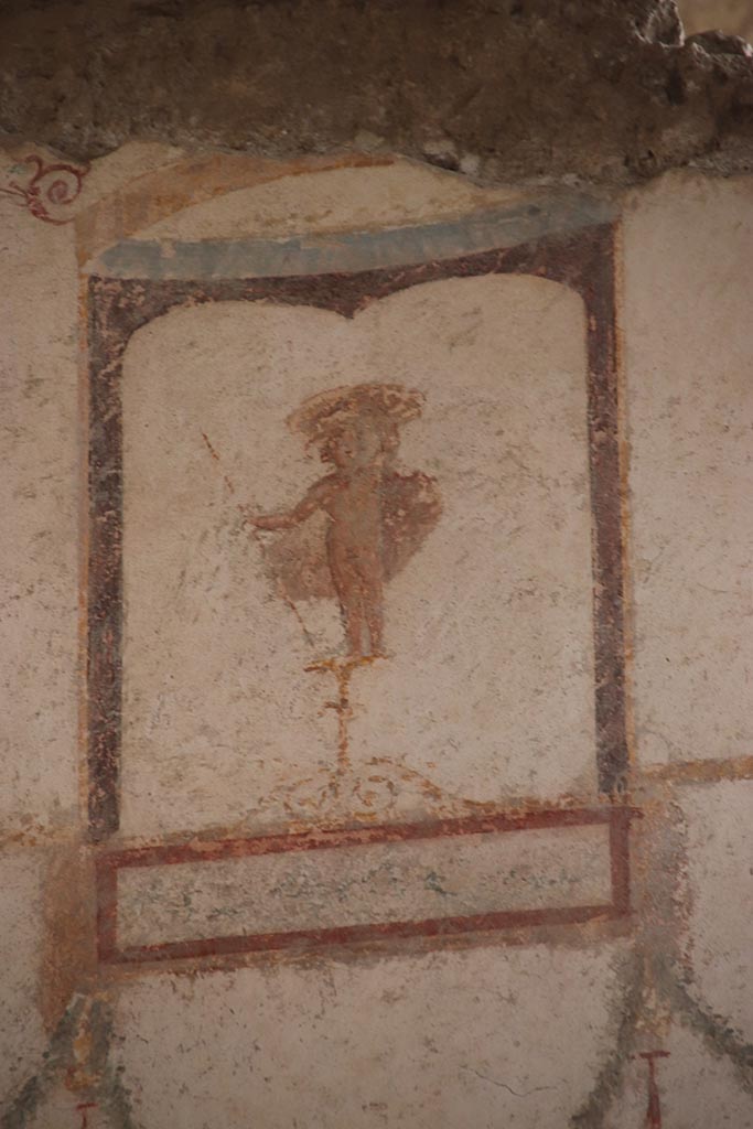 I.6.4 Pompeii. October 2024. 
Room 5, detail of figure from upper north-east corner of east wall. Photo courtesy of Klaus Heese.