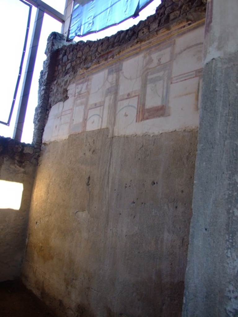 I.6.4 Pompeii.  March 2009.  Room 6, South wall showing the incomplete painted wall.  The upper wall is finished, but the lower area only shows the plaster, which is still waiting for its decoration.  The north wall is similar.
The painters were interrupted.  See De Carolis, E., 2001. Gods and Heroes in Pompeii.  Roma: Bretschneider.  (p.31, T:27, 28).