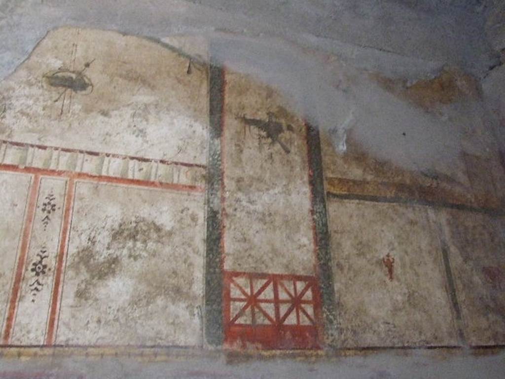 I.6.7 Pompeii. December 2006. Detail of north end of west wall of room to west of entrance.
