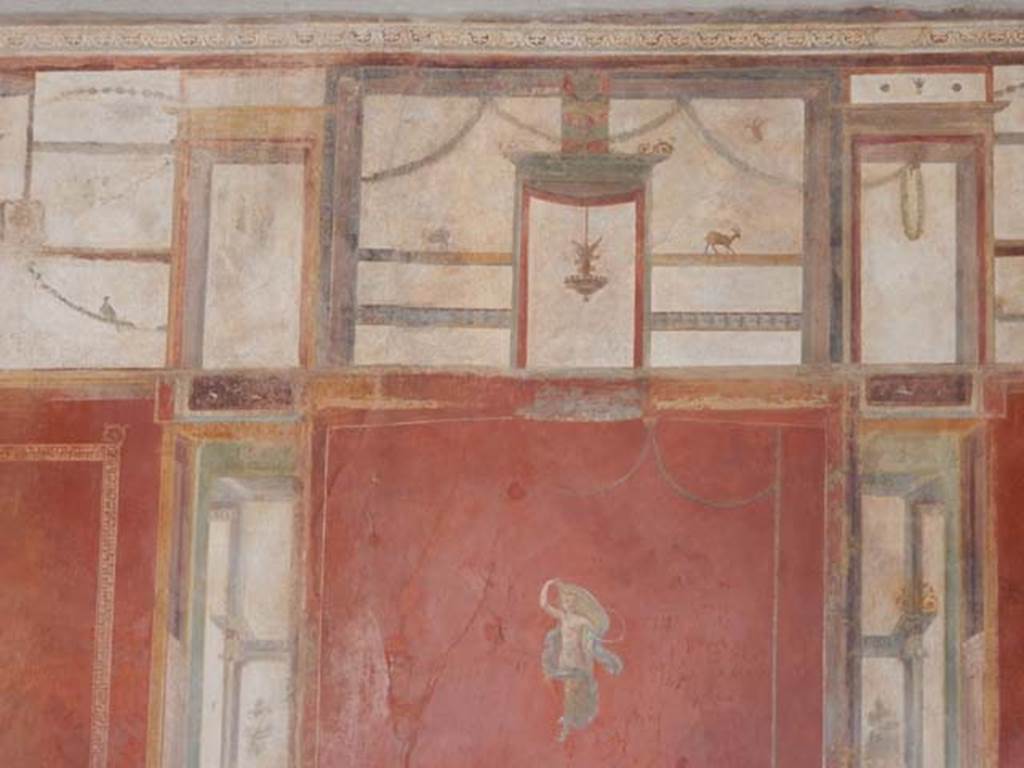 I.6.7 Pompeii. May 2016. Detail from centre panel on east wall of large oecus.   Photo courtesy of Buzz Ferebee.