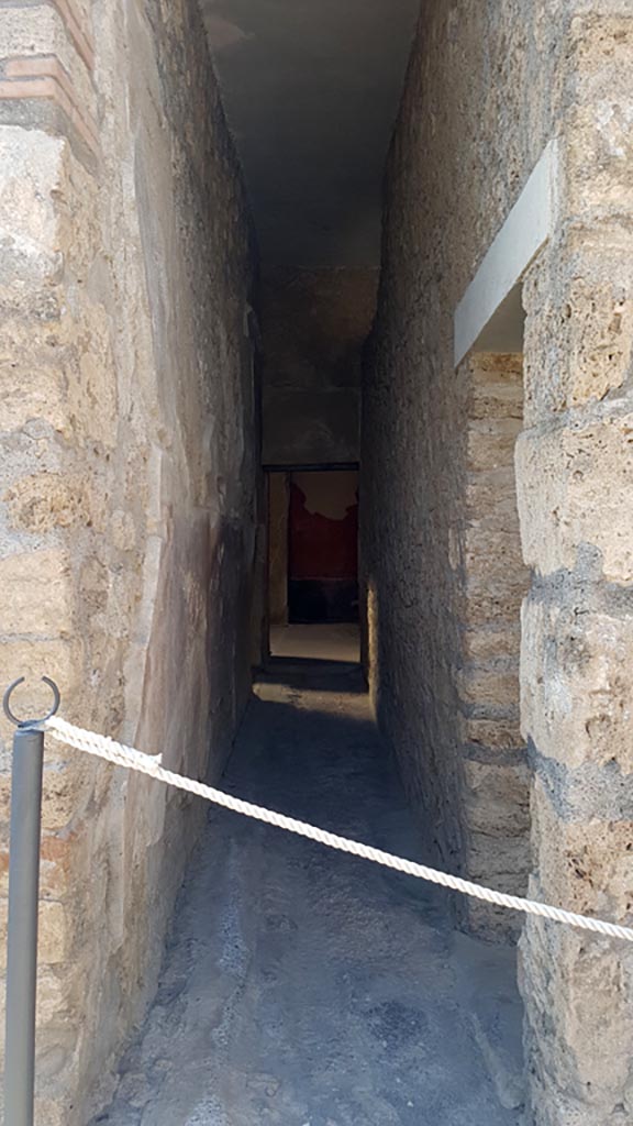 I.6.7 Pompeii. August 2023. 
Looking north along corridor from garden area towards atrium. 
Photo courtesy of Maribel Velasco.