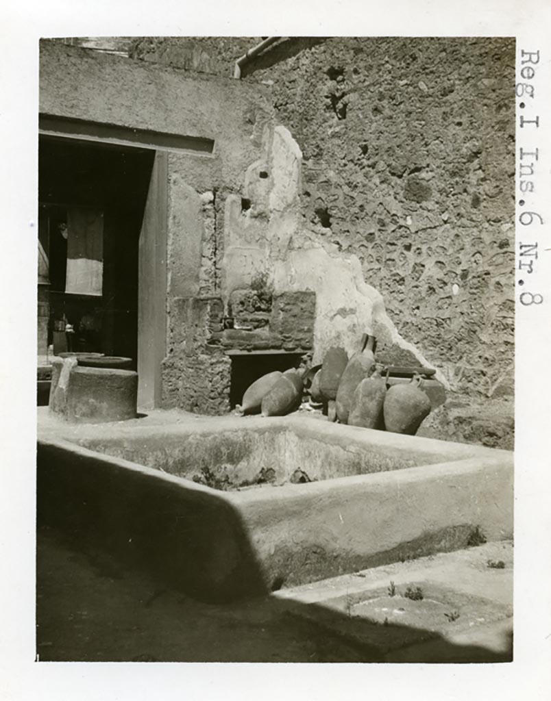 I.6.8/9 Pompeii. Pre-1937-39. Looking north-east from impluvium in atrium towards shop at I.6.8, on left.
Photo courtesy of American Academy in Rome, Photographic Archive. Warsher collection no. 1852.