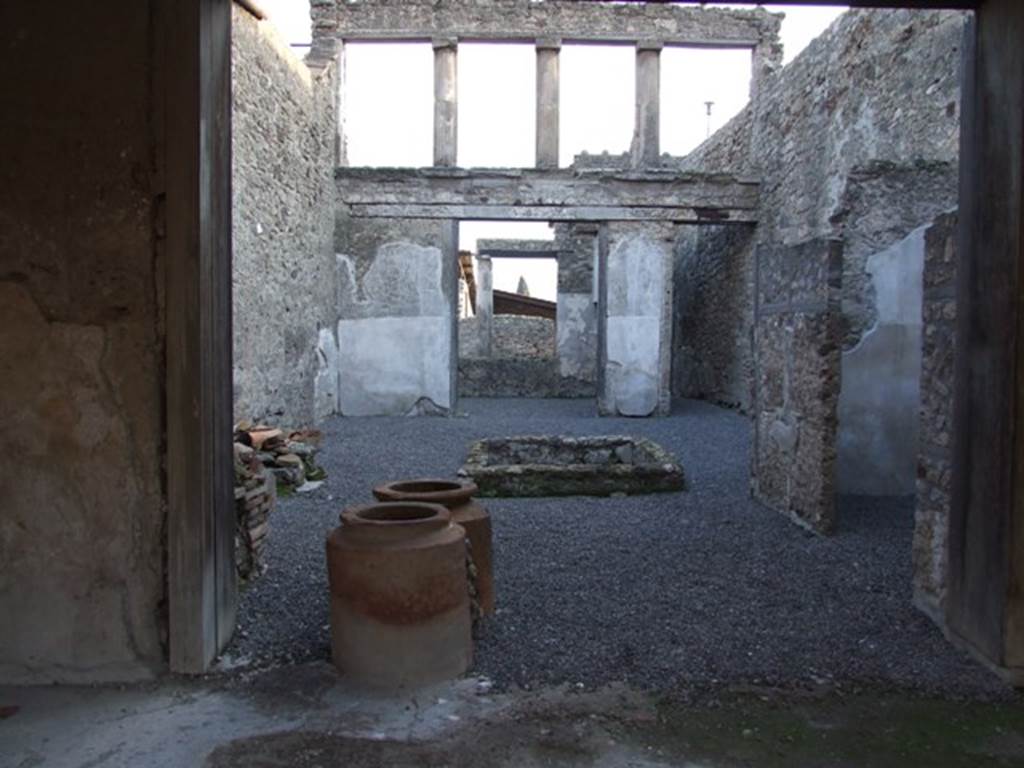 I.6.9 Pompeii. December 2007.  Looking south across atrium towards tablinum with window to garden and corridor at side.