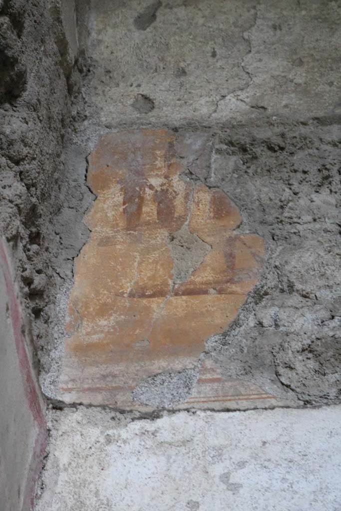 I.6.10 Pompeii. December 2018. 
Detail of remaining plaster on east end of south wall. Photo courtesy of Aude Durand.