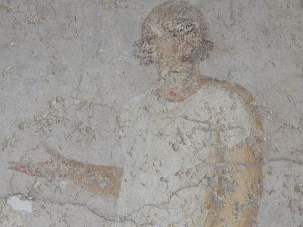 I.6.11 Pompeii. May 2015. Detail of figure from wall painting from north end of west wall. Photo courtesy of Buzz Ferebee.