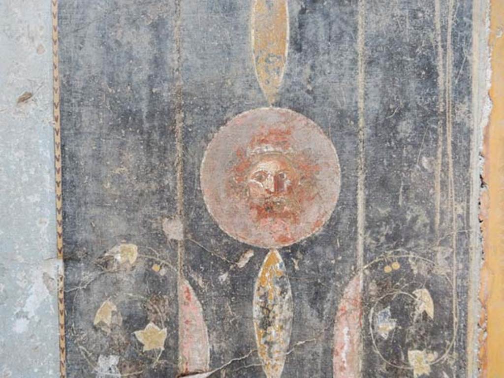 I.6.11 Pompeii. May 2015. West wall of atrium, on north side of doorway to cubiculum 4, detail of painted decoration. Photo courtesy of Buzz Ferebee.
