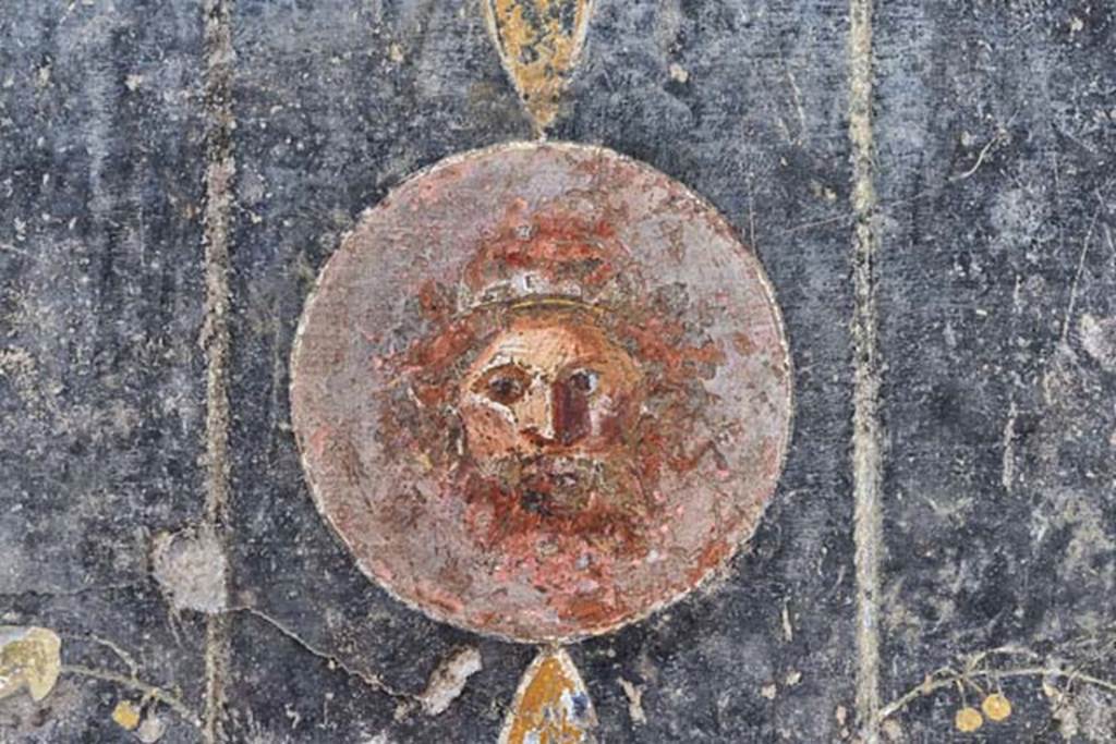 I.6.11 Pompeii. April 2018. West wall of atrium, on north side of doorway to cubiculum 4, detail of painted decoration.
Photo courtesy of Ian Lycett-King. 
Use is subject to Creative Commons Attribution-NonCommercial License v.4 International.