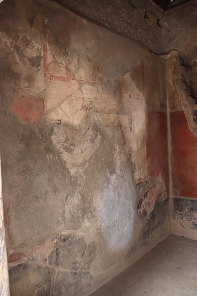 I.6.15 Pompeii. October 2023. 
Room 11, looking east along north wall from doorway. Photo courtesy of Klaus Heese.